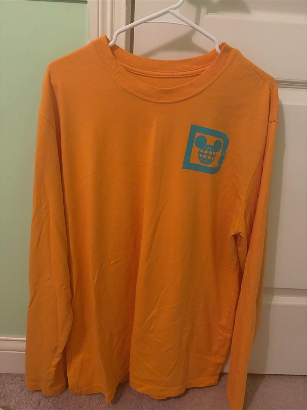 Men’s size large Disney Orange Long Sleeve Tee with Teal Mickey Logo